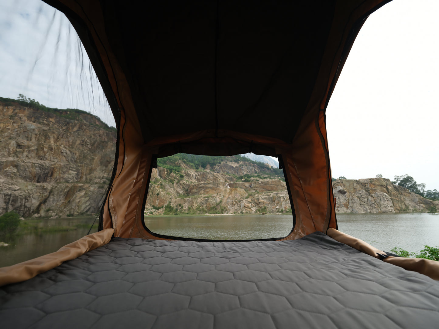 Interior view of Bush Cruiser V2 Pro Rooftop Tent with three windows