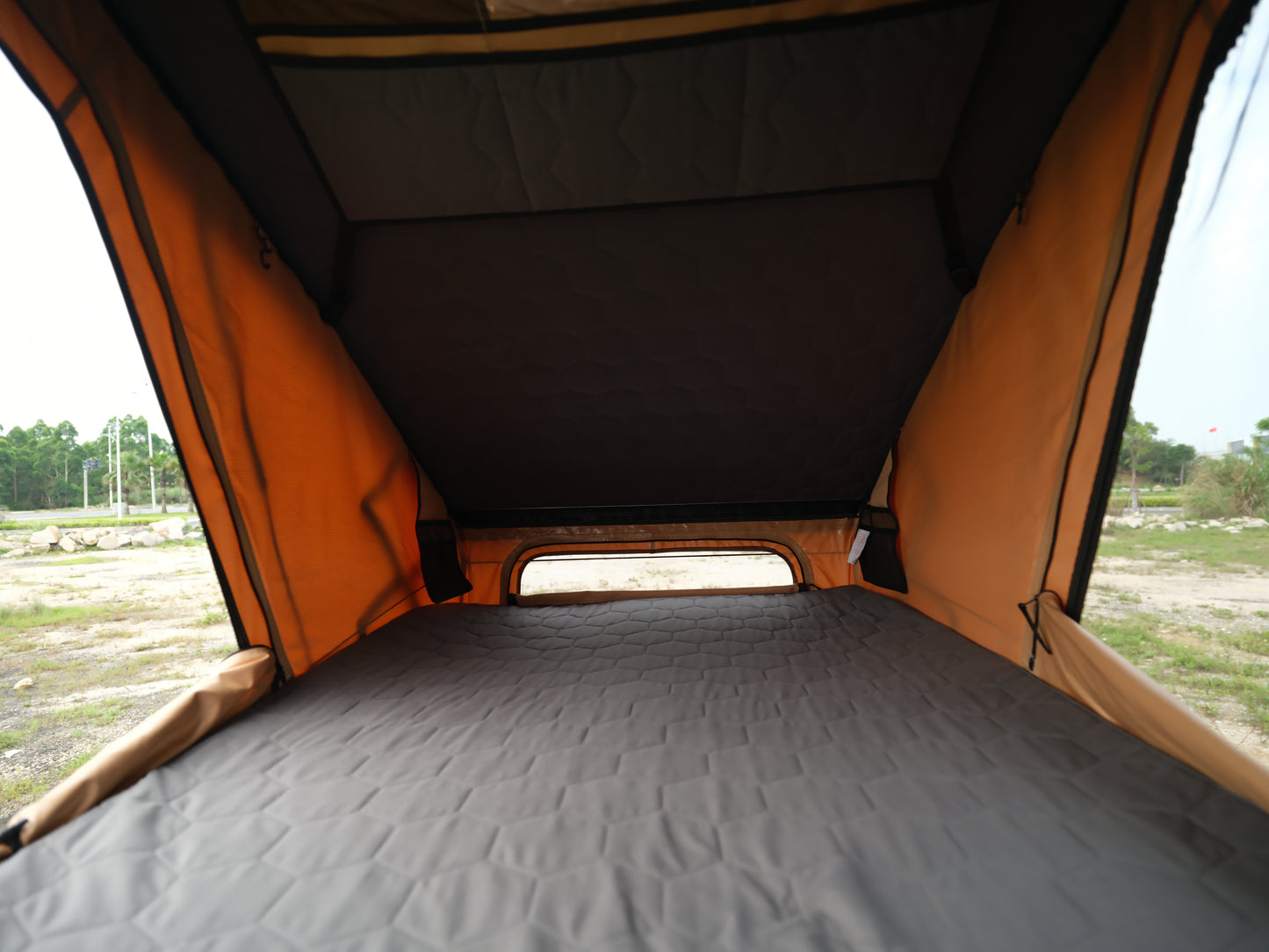 Interior view of Bush Cruiser V2 Pro Rooftop Tent with spacious sleeping area